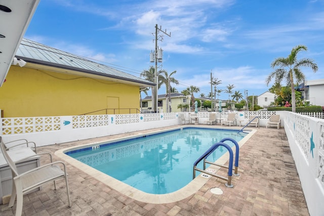 view of pool with a patio