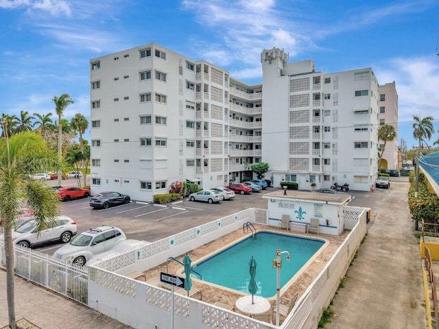 view of swimming pool featuring a patio area