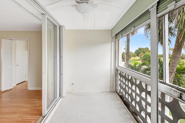 balcony featuring ceiling fan