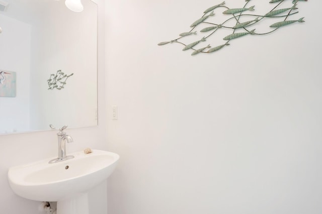 bathroom with a sink and visible vents