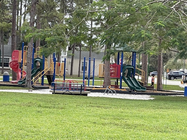 community play area featuring a yard