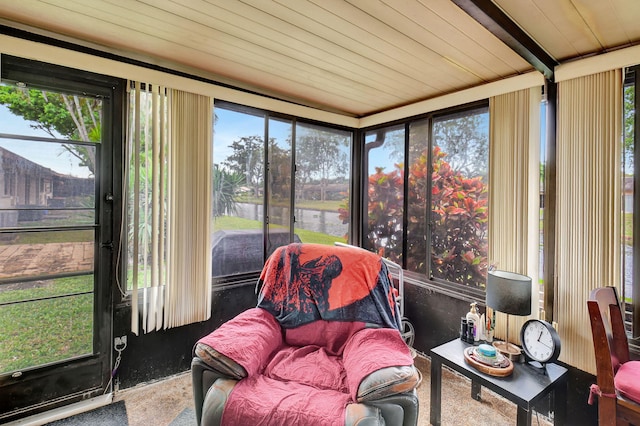 sunroom / solarium featuring wooden ceiling