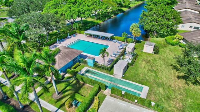 birds eye view of property featuring a water view