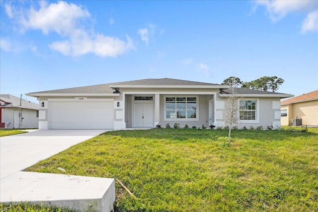 ranch-style home with a garage, cooling unit, and a front lawn