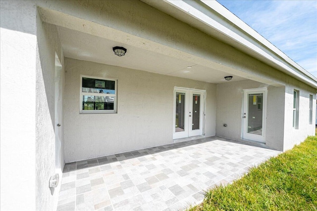 exterior space with french doors and a patio