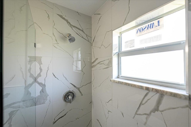 bathroom featuring walk in shower