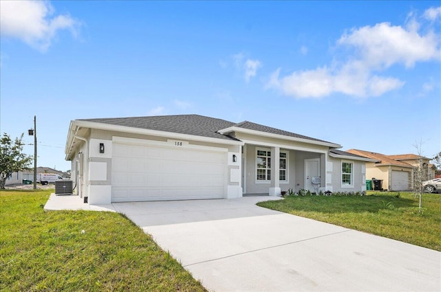 ranch-style home with a front lawn, cooling unit, and a garage