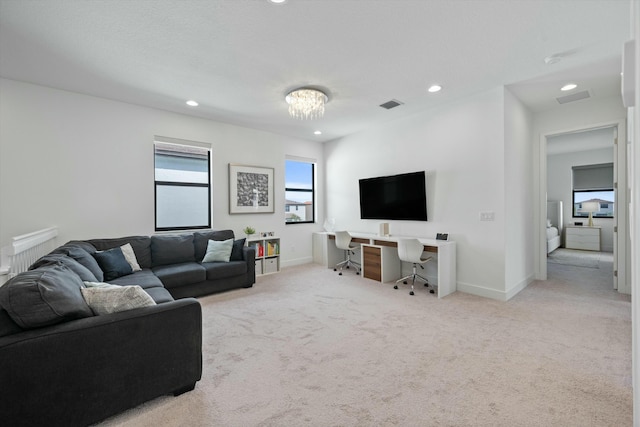 living room featuring baseboards, recessed lighting, visible vents, and light colored carpet