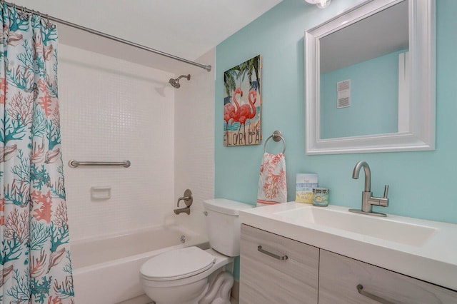 bathroom with visible vents, vanity, toilet, and shower / bath combo with shower curtain