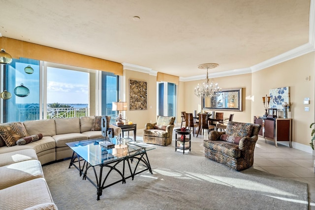 living area with a chandelier, ornamental molding, tile patterned flooring, and baseboards