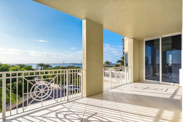 balcony featuring a water view