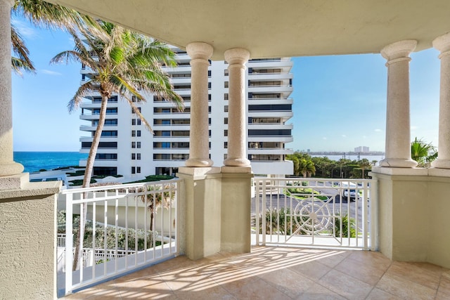 balcony featuring a water view
