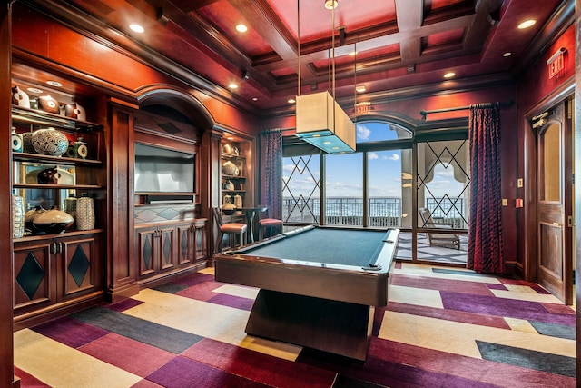 recreation room featuring ornamental molding, coffered ceiling, pool table, beamed ceiling, and built in features