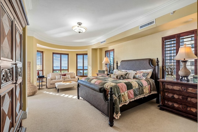 carpeted bedroom featuring crown molding