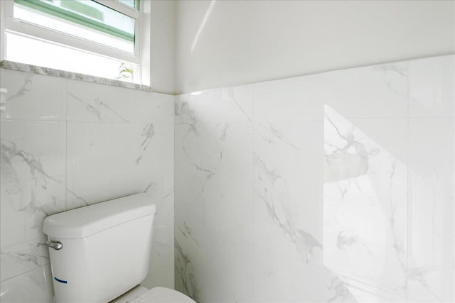bathroom featuring toilet