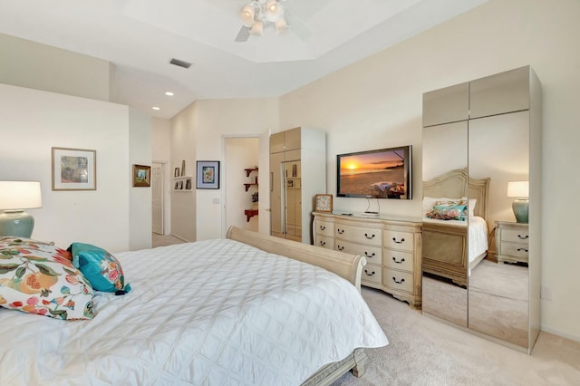 bedroom featuring ceiling fan, lofted ceiling, recessed lighting, light carpet, and visible vents