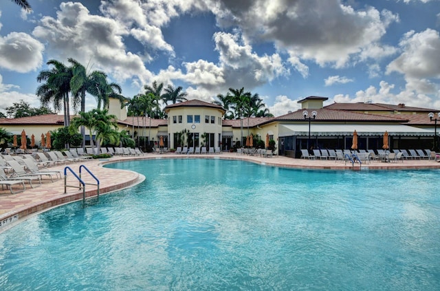 community pool with a patio