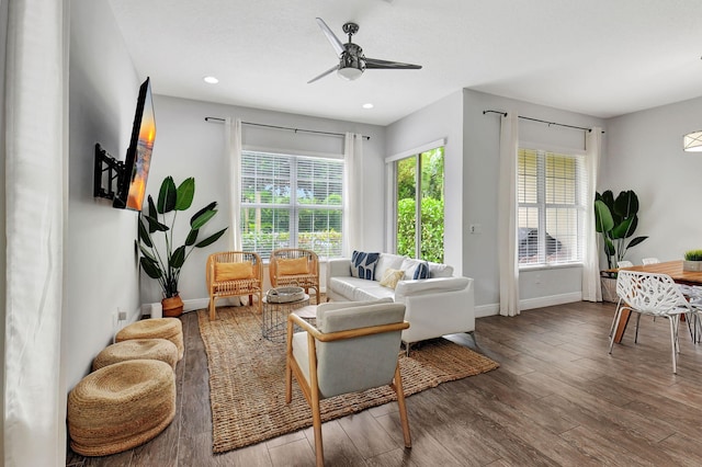 interior space featuring ceiling fan, recessed lighting, wood finished floors, and baseboards