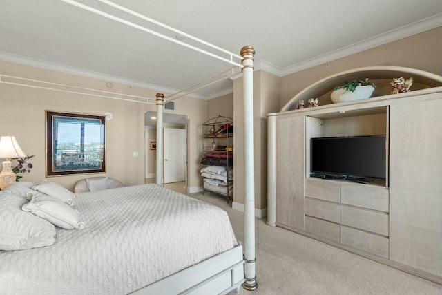 carpeted bedroom featuring crown molding