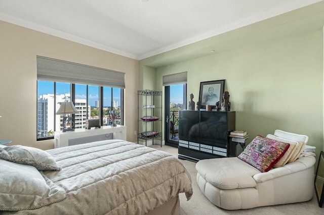 carpeted bedroom featuring ornamental molding