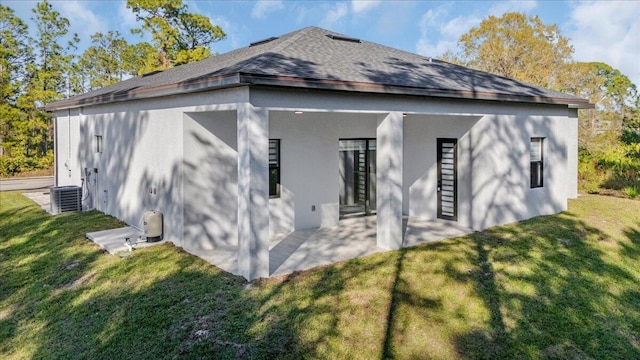 view of property exterior featuring a yard and a patio area