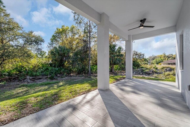 view of patio / terrace featuring ceiling fan