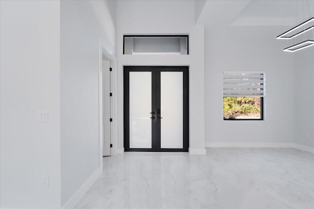 entrance foyer featuring french doors