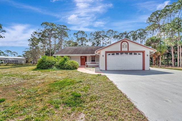 single story home with a garage and a front lawn