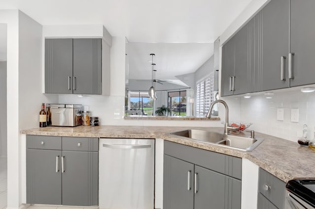 15334 Strathearn Dr Unit 12104, Delray Beach, FL 33446 - kitchen featuring gray cabinetry, stainless steel appliances, and backsplash