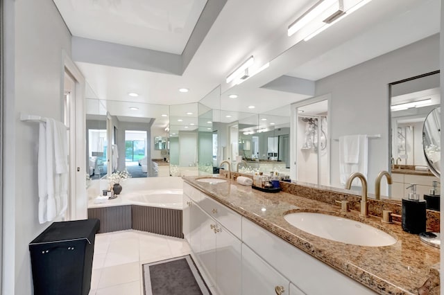 15334 Strathearn Dr Unit 12104, Delray Beach, FL 33446 - bathroom featuring double vanity, a garden tub, and tile patterned floors