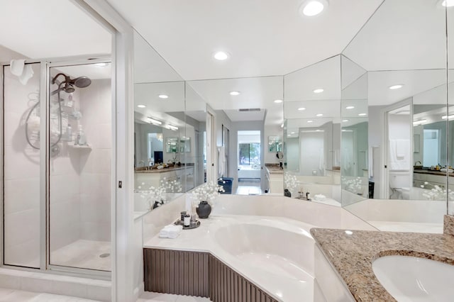 15334 Strathearn Dr Unit 12104, Delray Beach, FL 33446 - full bath featuring a stall shower, vanity, a garden tub, and recessed lighting
