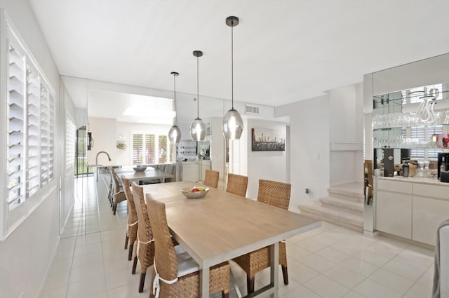 15334 Strathearn Dr Unit 12104, Delray Beach, FL 33446 - dining area featuring light tile patterned floors and stairway