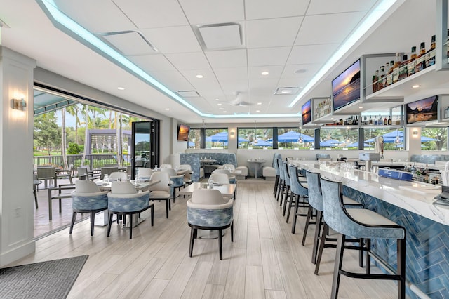 15334 Strathearn Dr Unit 12104, Delray Beach, FL 33446 - dining room featuring a raised ceiling and a drop ceiling