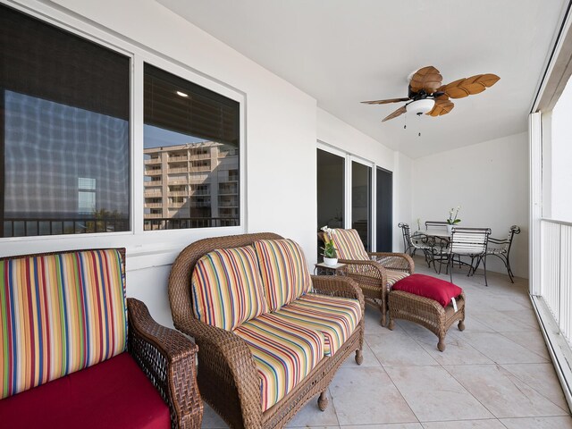 exterior space featuring ceiling fan