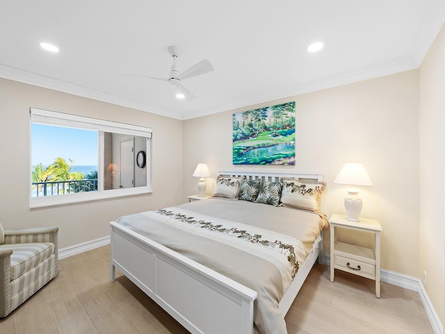 bedroom featuring light hardwood / wood-style floors, ceiling fan, and ornamental molding