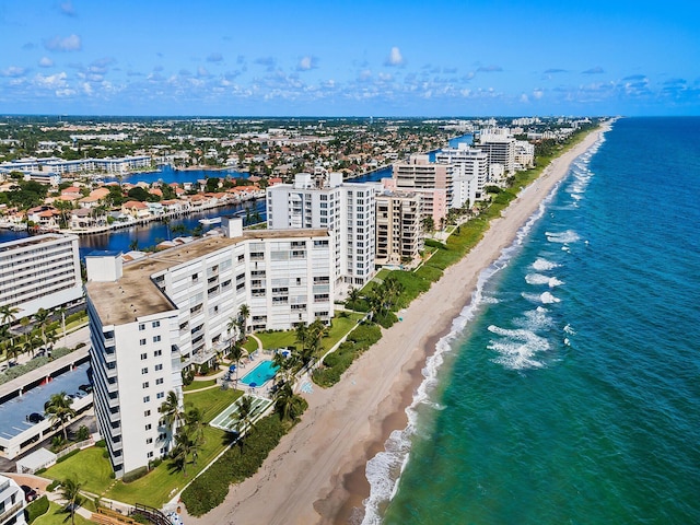 aerial view featuring a water view and a view of the beach