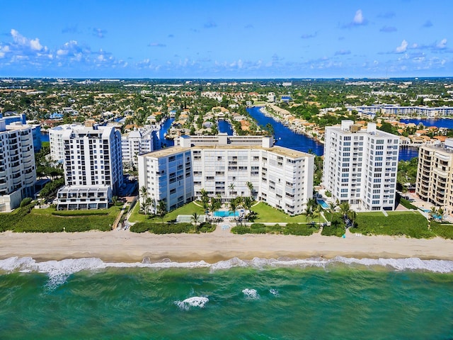 aerial view featuring a water view and a view of the beach