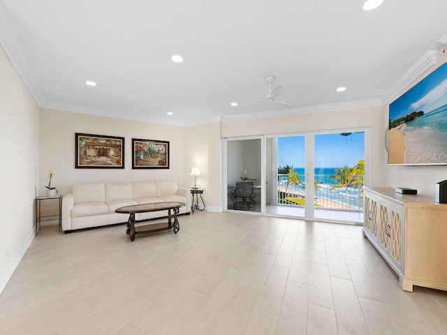 living room with ceiling fan, ornamental molding, and light hardwood / wood-style floors