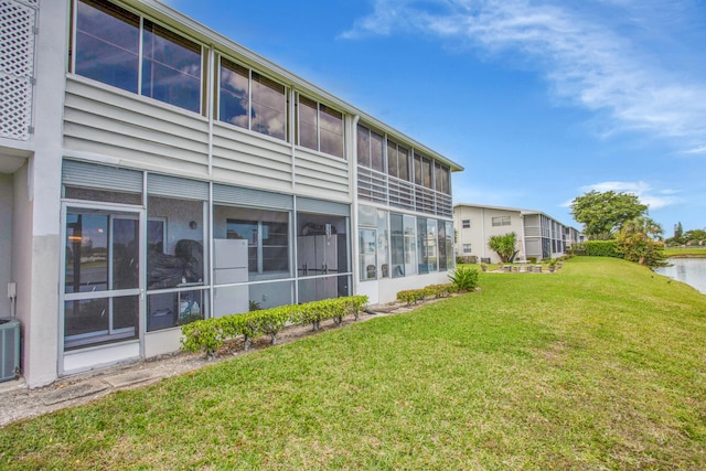 exterior space with a water view