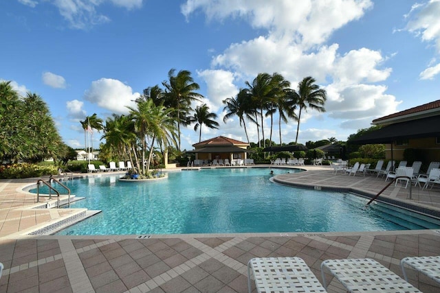 community pool with a patio