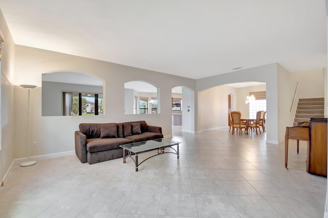 living room featuring light tile patterned flooring