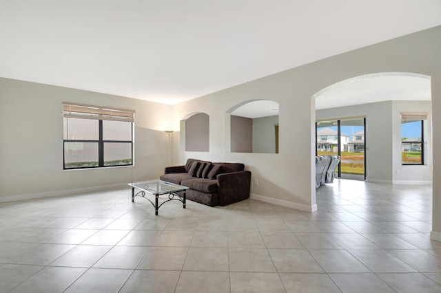 living room with light tile patterned floors