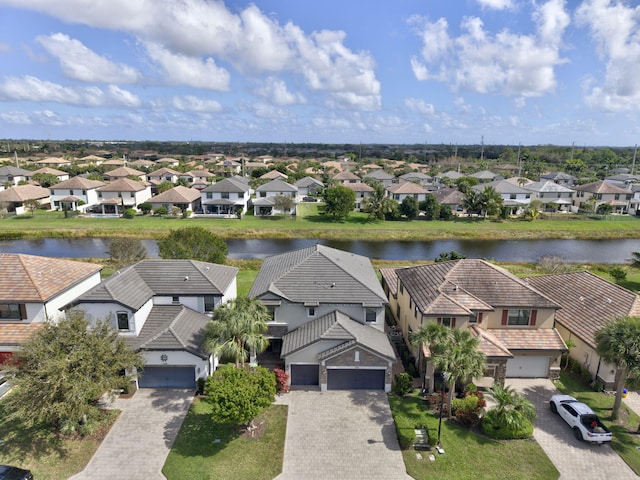 bird's eye view with a water view