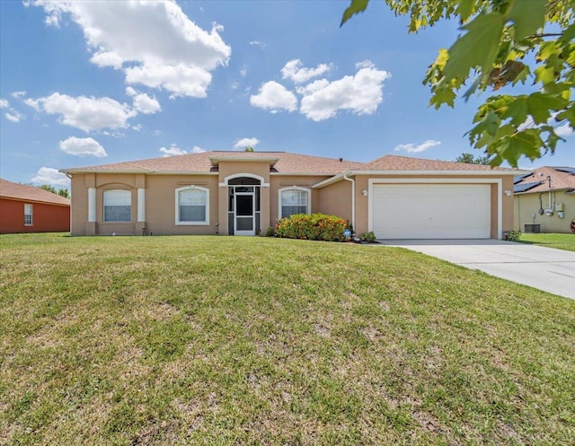 view of front facade with a front lawn and a garage