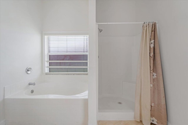 bathroom with independent shower and bath