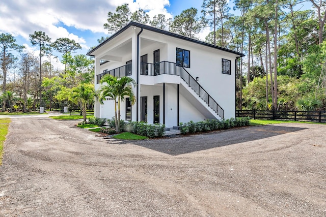 view of side of home featuring a garage