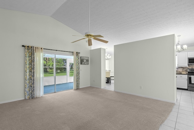 unfurnished living room featuring ceiling fan with notable chandelier, vaulted ceiling, light carpet, and a textured ceiling