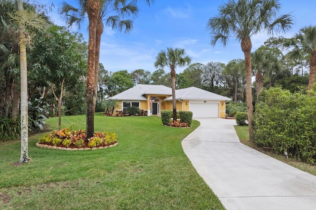 single story home featuring driveway, a garage, a front lawn, and stucco siding