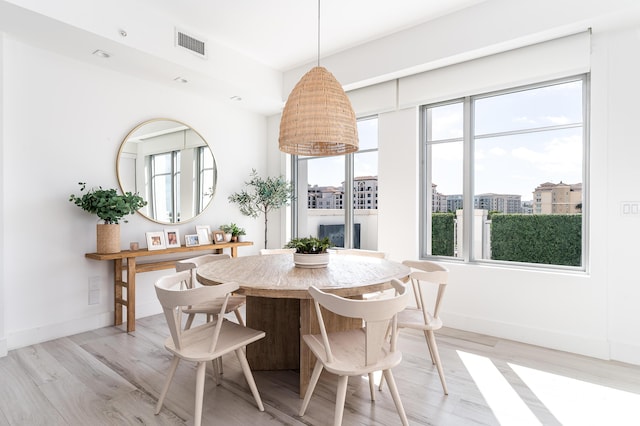 dining room featuring light wood-type flooring