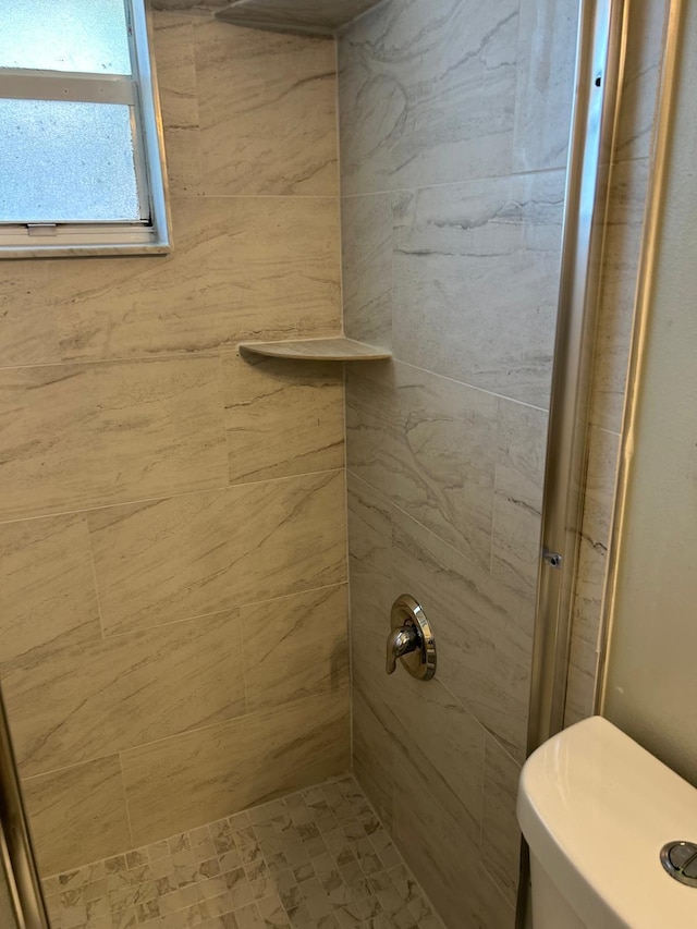 1732 SW Alegre St, Port Saint Lucie, FL 34953 - bathroom featuring tiled shower and toilet
